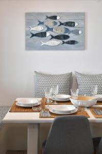 Posezení v ubytování Ammos Luxury Rooms & Home