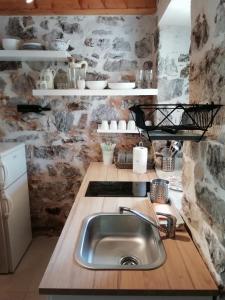 Kuchyň nebo kuchyňský kout v ubytování Krka Waterfalls Stonehouse Roko