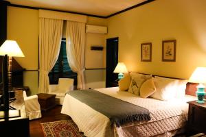 Cama ou camas em um quarto em Hotel Capim Limão Itaipava