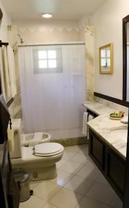 Um banheiro em Hotel Capim Limão Itaipava
