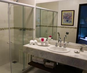 Um banheiro em Hotel Capim Limão Itaipava