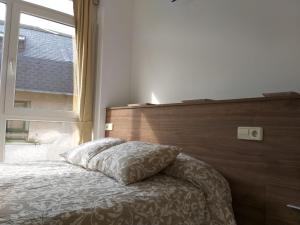 Posteľ alebo postele v izbe v ubytovaní Apartamento en Ribeira(centro) 4* planta