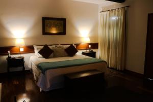 Cama ou camas em um quarto em Hotel Capim Limão Itaipava