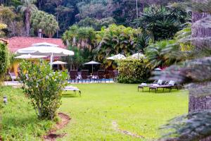 Um jardim em Hotel Capim Limão Itaipava