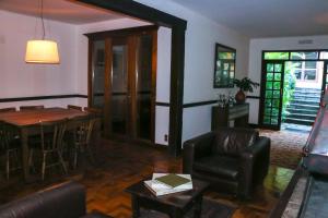 Uma área de estar em Hotel Capim Limão Itaipava