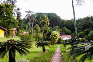 Um jardim em Hotel Capim Limão Itaipava