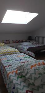 Llit o llits en una habitació de Gite de kernaet avec piscine