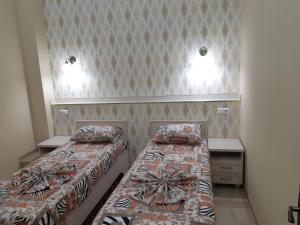 Cama o camas de una habitación en Alvis Guest House