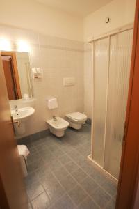 Koupelna v ubytování Hotel da Roberto