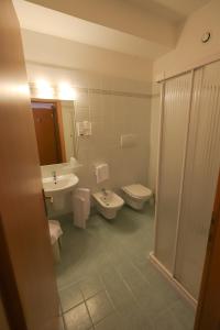 Koupelna v ubytování Hotel da Roberto