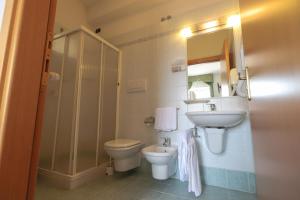 Koupelna v ubytování Hotel da Roberto
