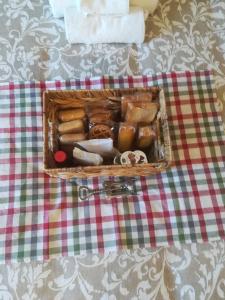 a basket of food sitting on top of a table at Ila in Fiera in Rome