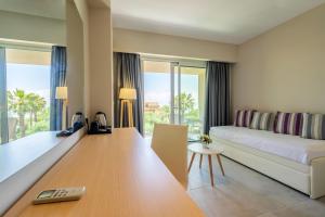 Postel nebo postele na pokoji v ubytování CNic Gemini Hotel
