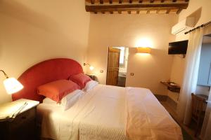 A bed or beds in a room at Casa Minotti Relais