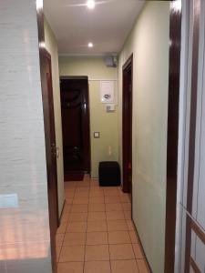 a hallway with a room with two doors and a room with a hallwayngthngth at Апартаменты в центре in Chernihiv