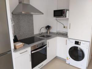 Una cocina o zona de cocina en Apartamento en Ribeira(centro) 2* planta