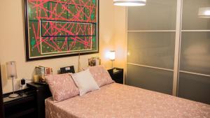 Posteľ alebo postele v izbe v ubytovaní Apartamento El Salón