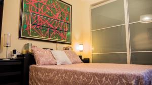 Posteľ alebo postele v izbe v ubytovaní Apartamento El Salón