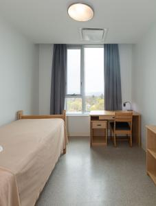 Postel nebo postele na pokoji v ubytování Dalhousie University