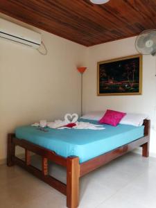 Ένα ή περισσότερα κρεβάτια σε δωμάτιο στο Hostal Naybrep