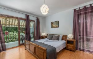 Postel nebo postele na pokoji v ubytování Apartments Rakovac