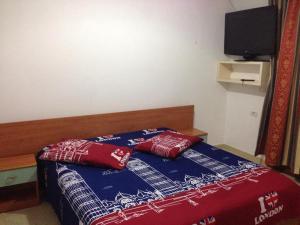 Postel nebo postele na pokoji v ubytování Hotel Moris