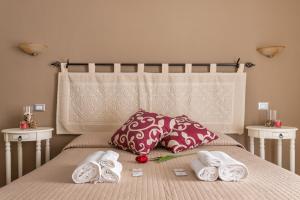 Postel nebo postele na pokoji v ubytování B&B Villamarì