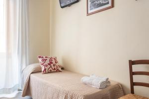 Postel nebo postele na pokoji v ubytování B&B Villamarì