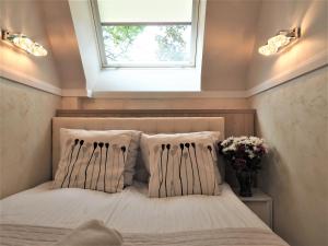 Posteľ alebo postele v izbe v ubytovaní VIP Apartamenty Cristal