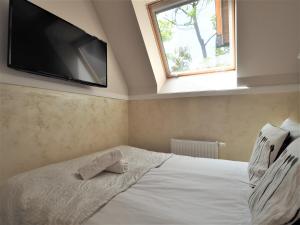 Posteľ alebo postele v izbe v ubytovaní VIP Apartamenty Cristal