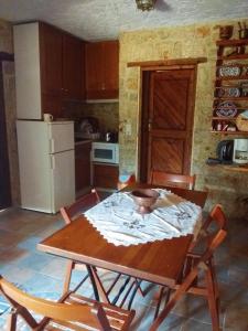 A kitchen or kitchenette at Rosalia Apartments