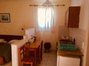 Kuchyň nebo kuchyňský kout v ubytování Moros Apartments