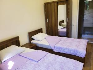 Postel nebo postele na pokoji v ubytování HOSTEL FAMILY
