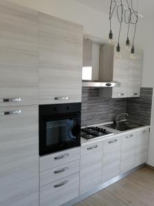 Kuchyň nebo kuchyňský kout v ubytování Appartamento fronte mare