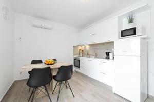 Kuchyň nebo kuchyňský kout v ubytování Villa Silver
