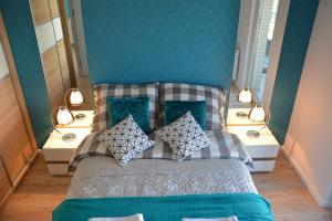 Cama ou camas em um quarto em Turkusowe Marzenie