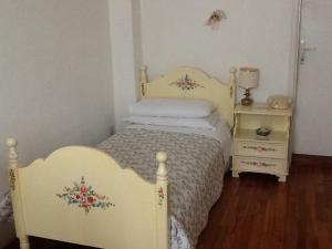 Postel nebo postele na pokoji v ubytování Hotel Due Pini