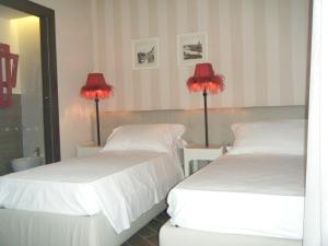 Postel nebo postele na pokoji v ubytování B&B Verona Centro