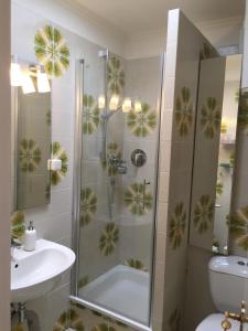 Koupelna v ubytování Haus Solymar App. Meerblick + 16 fotografií