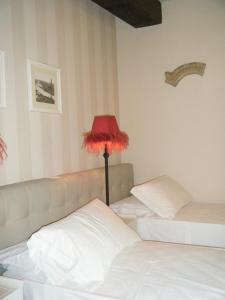 Postel nebo postele na pokoji v ubytování B&B Verona Centro