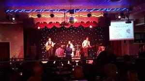a group of people on a stage with a performance at Private Caravan on Golden Sands Holiday Park, North Wales in Foryd +54 photos