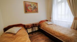 Posteľ alebo postele v izbe v ubytovaní Only Kraków Apartments