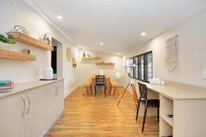 A kitchen or kitchenette at North Central Holiday Home