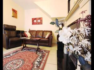 Posezení v ubytování Sive Budget Accommodation
