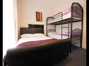Postel nebo postele na pokoji v ubytování Sive Budget Accommodation