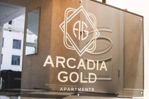 Naktsmītnes Arcadia Gold logotips vai norāde