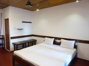 Postel nebo postele na pokoji v ubytování Riviera Resort + 27 fotografií