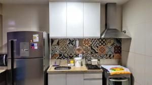 A cozinha ou cozinha compacta de Linda Casa de Praia em Itacimirim