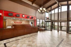a court room with a bench and avertisement at Ramada by Wyndham Spokane Airport in Spokane