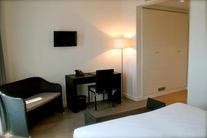 Postel nebo postele na pokoji v ubytování Tag Hotel + 37 fotografií